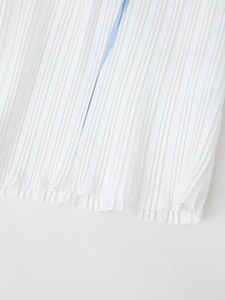 Detailed macro view of white pleated fabric with a subtle light blue ribbon accent detail