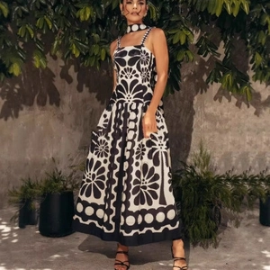 Summer black and white floral maxi dress with thin straps and matching choker neck accessory