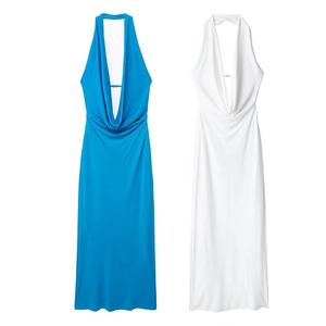 Detail view of royal blue and white halter neck dresses with draped V-neck design