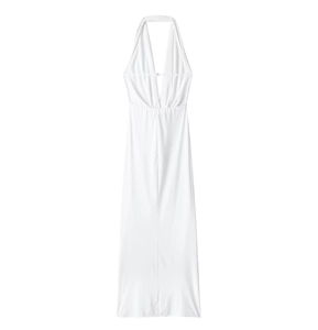 Detailed view of white halter neck maxi dress with deep V-neckline and backless design