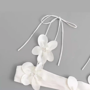 Summer white top featuring 3D floral accents and elegant slender tie straps for women