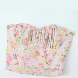 Robe bustier à fleurs en coton rose avec motifs floraux orange et jaune pour l'été