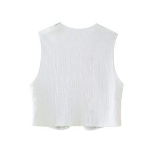 Minimalist white sleeveless cropped vest with textured fabric for summer street style