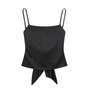 Elegant black satin camisole with thin straps and a decorative bow tie hem on white background
