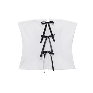White retro strapless tube top with three black satin bows on clean background