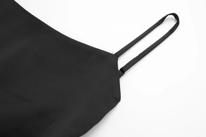 Close-up of the delicate straps and clean stitching on a black satin texture top