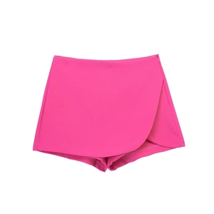 Women's hot pink high-waist asymmetric skort with smooth woven fabric and hidden zipper