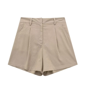 Detailed view of khaki linen blend high waisted shorts with pleats and side pockets