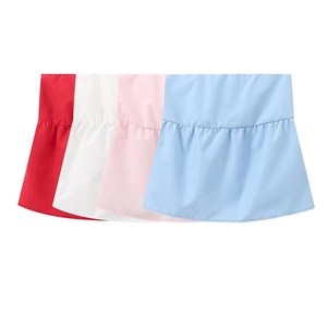 Detail view of four-color cotton tiered shirt hem extenders in red white pink and blue