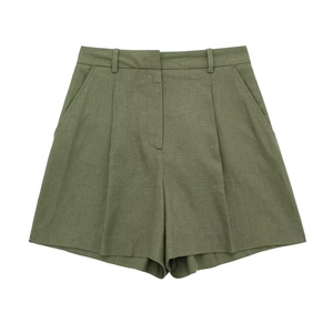 Detail of army green high-waisted cotton linen wide-leg shorts with pleated texture