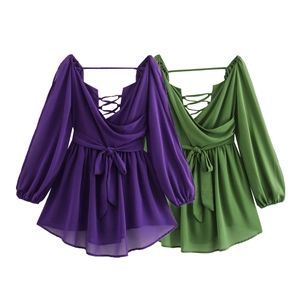 Detail of V-neck chiffon tops with open back lace-up design in purple and green