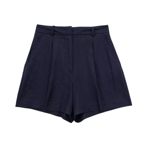 Detailed close-up of navy blue linen blend pleated high-waisted shorts with side pockets