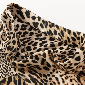 Women's summer midi dress featuring trendy leopard animal print and soft fabric