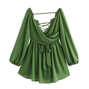 Elegant dark green V-neck lantern sleeve dress with open back and tie waist details