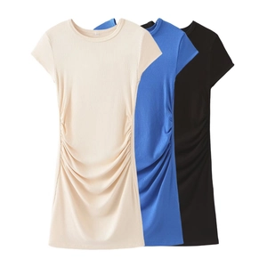 Detailed texture of ribbed knit fabric on bodycon dresses in beige, blue, and black