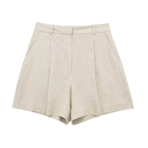 Detailed view of oatmeal high-waist linen blend shorts with pleated texture and pockets