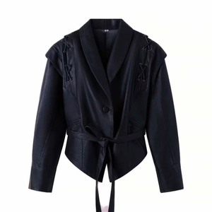 Women's black PU leather jacket with shawl collar, waist belt, and shoulder lace-up detail