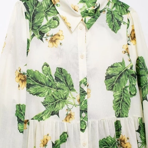 Women floral print button-up shirt with green leaves and yellow flowers in ivory white