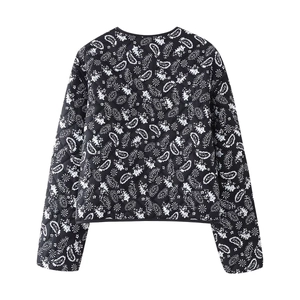 Women's black quilted jacket with white paisley floral print and diamond stitching pattern