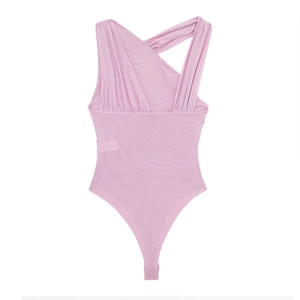 Detail of light pink asymmetrical one-shoulder bodysuit with elegant ruched mesh fabric