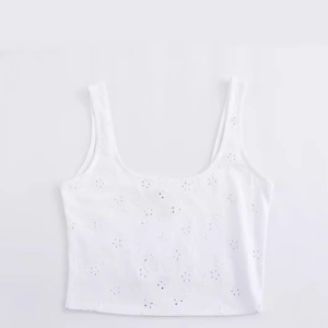 Robe courte sans manches blanche avec broderie anglaise élégante et motifs floraux