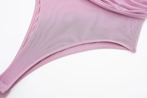 Detail of pink mesh bodysuit showing fine stitching and breathable elastic fabric