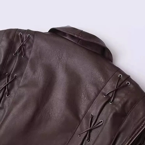 Women's dark brown faux leather jacket featuring unique lace-up shoulder details