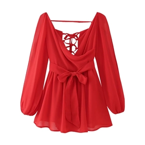 Detailed back view of red chiffon dress with lace-up back design and waist tie