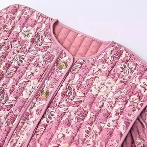 Women's floral quilted cotton vest with pink flower pattern and wood-textured buttons