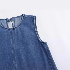 Light blue denim round neck dress with back tie detail and premium stitching finish
