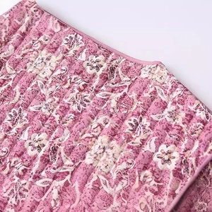 Pink floral quilted jacket for women with vintage patterns and vertical stitched textures