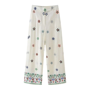 Broderie détaillée sur pantalon blanc taille haute à jambes larges et fleurs