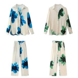 Detailed view of floral print long sleeve shirt and wide leg pants sets in silk blend