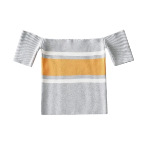 Detail of the ribbed knit texture and striped pattern on the off-the-shoulder crop top