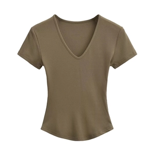Macro detail of ribbed texture and curved hem on olive green V-neck slim fit T-shirt