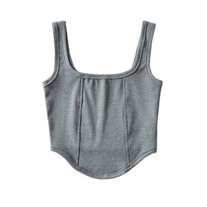 Detailed view of gray ribbed knit corset top with square neck and curved boning hem