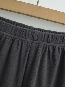 Detail showing elastic waistband and ribbed texture on loose fit summer casual shorts