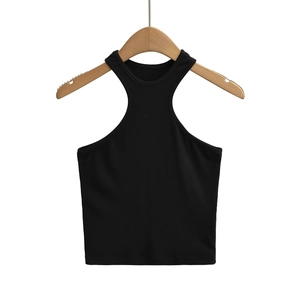 Detail of black ribbed knit crop top with halter neck and tight fit design