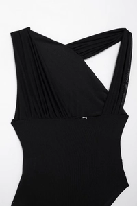 Close-up of black mesh bodysuit featuring asymmetric pleated neckline and ruched details
