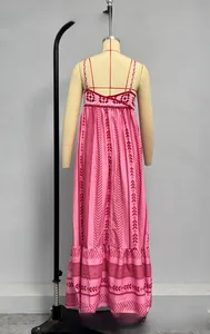 Detailed back view of pink crochet patchwork backless maxi dress with ethnic patterns
