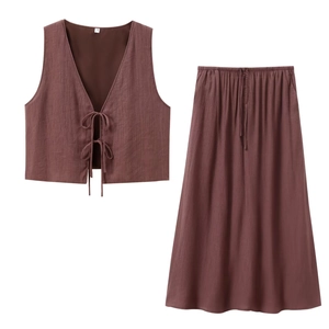 Vintage brown two-piece set featuring a V-neck tie-front vest and pleated maxi skirt