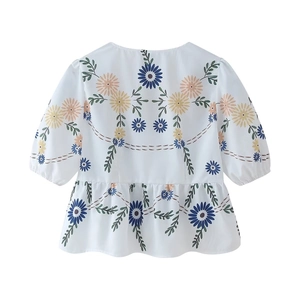 Women's summer white V-neck short sleeve top with colorful floral embroidery and peplum hem