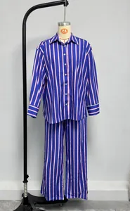 Detailed view of striped long sleeve pajamas with button shirt and matching pants