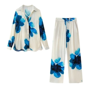 Women's two-piece set with long-sleeve floral shirt and matching wide-leg pants