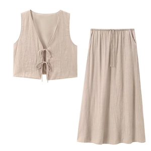 Women's summer two-piece set featuring a bow texture vest and matching long skirt in beige