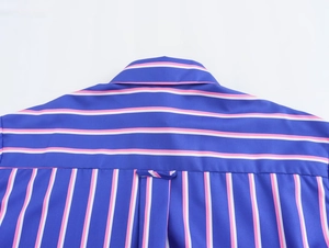 Detail of blue striped shirt back showing horizontal yoke and vertical pattern