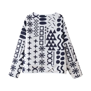 Veste matelassée réversible pour femme avec imprimé géométrique moderne noir et blanc