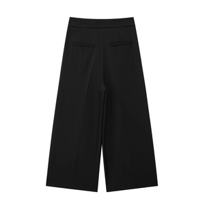 Rear view of high-waisted black wide-leg trousers with elegant back pocket details