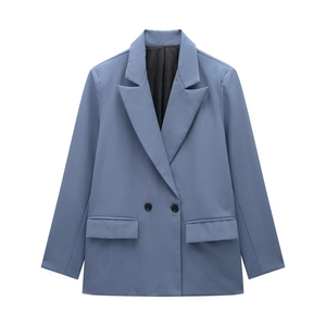 Detailed view of the lapel and black double buttons on grey blue blazer jacket