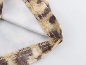 Close-up of leopard print cycling shorts showing high-quality stitching and fabric texture